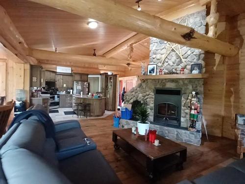 58211 Rr 31, Rural Barrhead County, AB - Indoor Photo Showing Living Room With Fireplace