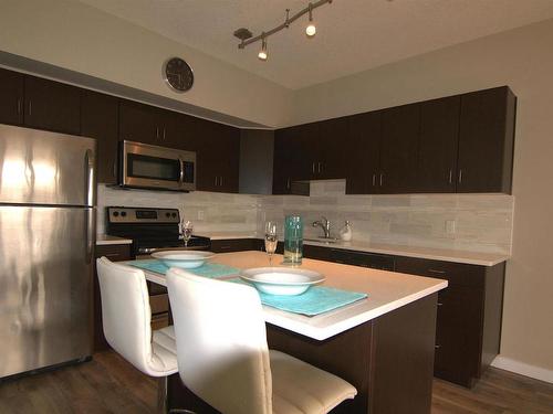 108 10518 113 Street, Edmonton, AB - Indoor Photo Showing Kitchen With Stainless Steel Kitchen