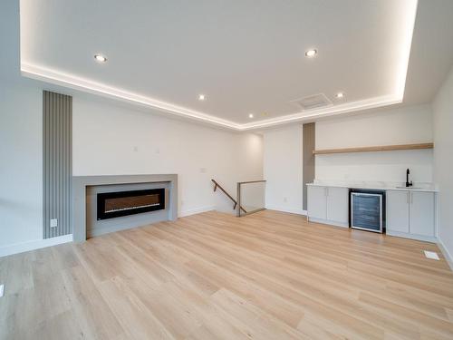 24 20425 93 Avenue, Edmonton, AB - Indoor Photo Showing Living Room With Fireplace