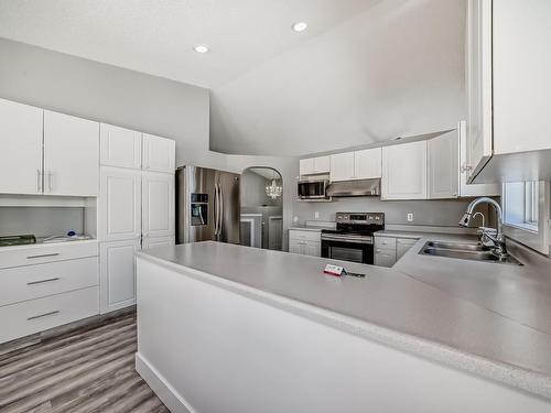 2932 41 Avenue, Edmonton, AB - Indoor Photo Showing Kitchen With Double Sink