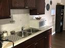 304 10615 110 Street Nw, Edmonton, AB  - Indoor Photo Showing Kitchen With Double Sink 