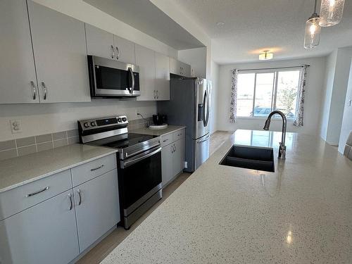 18007 71 Street, Edmonton, AB - Indoor Photo Showing Kitchen With Stainless Steel Kitchen With Double Sink