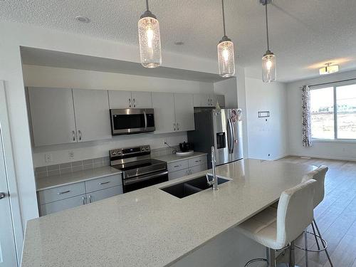 18007 71 Street, Edmonton, AB - Indoor Photo Showing Kitchen With Stainless Steel Kitchen With Double Sink