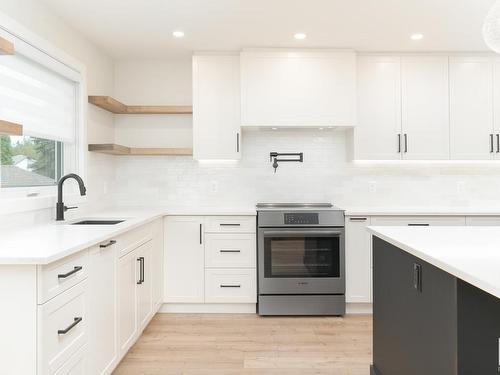 38 Heartwood Lane, Stony Plain, AB - Indoor Photo Showing Kitchen With Upgraded Kitchen