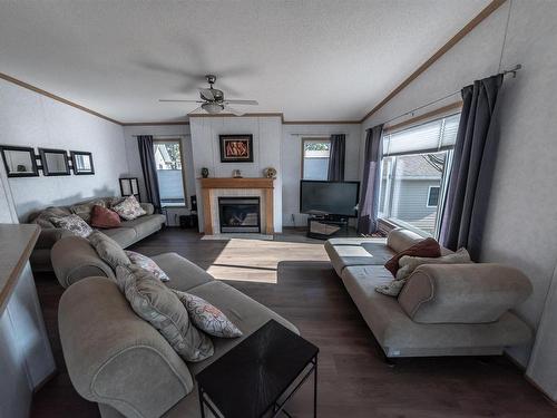 4916 56 Street, Rural Lac Ste. Anne County, AB - Indoor Photo Showing Living Room With Fireplace