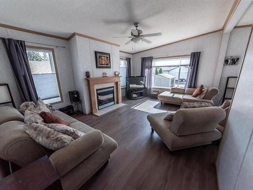 4916 56 Street, Rural Lac Ste. Anne County, AB - Indoor Photo Showing Living Room With Fireplace