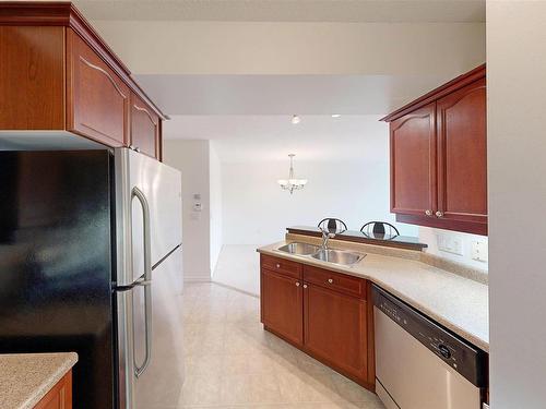 220 7510 89 Street, Edmonton, AB - Indoor Photo Showing Kitchen With Stainless Steel Kitchen With Double Sink