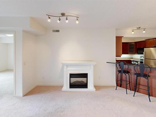 220 7510 89 Street, Edmonton, AB - Indoor With Fireplace