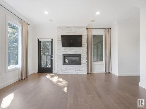 9433 142 Street, Edmonton, AB - Indoor Photo Showing Living Room With Fireplace