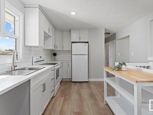 1211 5 Avenue, Cold Lake, AB - Indoor Photo Showing Kitchen With Double Sink