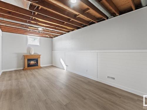 1211 5 Avenue, Cold Lake, AB - Indoor Photo Showing Other Room With Fireplace