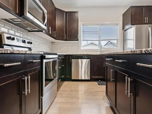 2439 18 Avenue, Edmonton, AB - Indoor Photo Showing Kitchen With Stainless Steel Kitchen