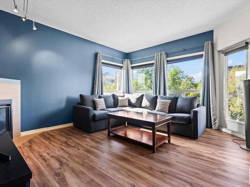 315 10235 112 Street, Edmonton, AB - Indoor Photo Showing Living Room With Fireplace