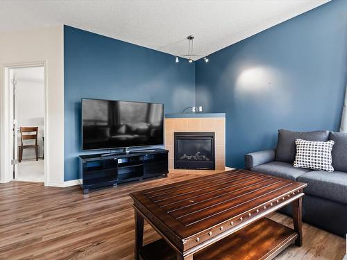 315 10235 112 Street, Edmonton, AB - Indoor Photo Showing Living Room With Fireplace