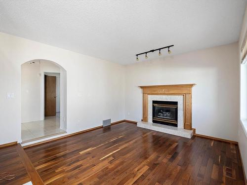 15936 59 Street, Edmonton, AB - Indoor Photo Showing Living Room With Fireplace