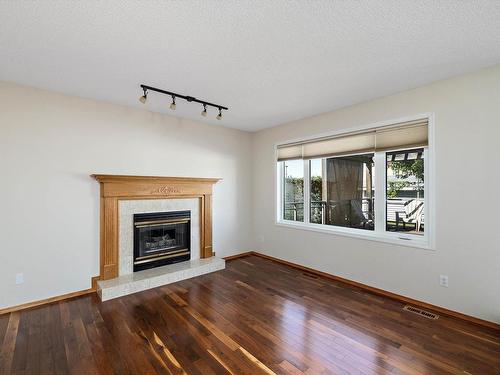 15936 59 Street, Edmonton, AB - Indoor Photo Showing Living Room With Fireplace