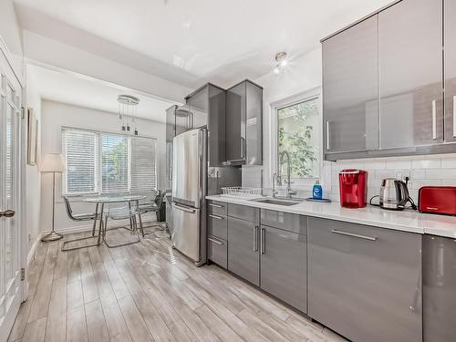 9831 83 Avenue, Edmonton, AB - Indoor Photo Showing Kitchen With Stainless Steel Kitchen With Upgraded Kitchen