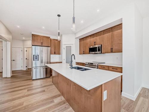 24 Jennifer Crescent, St. Albert, AB - Indoor Photo Showing Kitchen With Stainless Steel Kitchen With Double Sink With Upgraded Kitchen