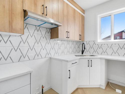 195 Ravine Drive, Devon, AB - Indoor Photo Showing Kitchen With Double Sink