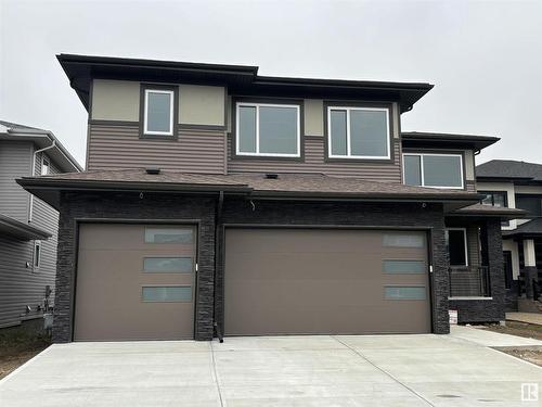 4404 Triomphe Close, Beaumont, AB - Outdoor With Facade