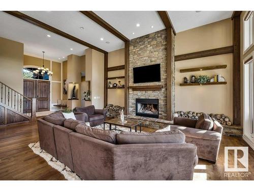 27209 Twp Road 512, Rural Parkland County, AB - Indoor Photo Showing Living Room With Fireplace