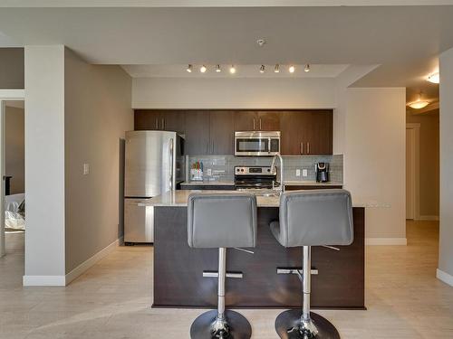 1006 10226- 104 Street Nw, Edmonton, AB - Indoor Photo Showing Kitchen With Stainless Steel Kitchen