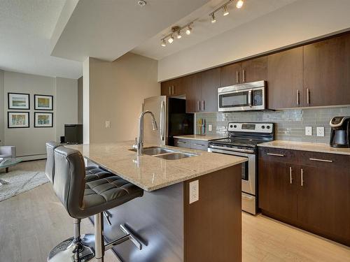 1006 10226- 104 Street Nw, Edmonton, AB - Indoor Photo Showing Kitchen With Stainless Steel Kitchen With Double Sink