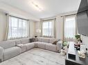 47 903 Crystallina Nera Way, Edmonton, AB  - Indoor Photo Showing Living Room 