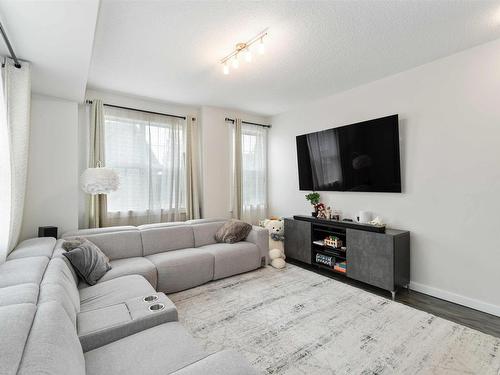 47 903 Crystallina Nera Way, Edmonton, AB - Indoor Photo Showing Living Room