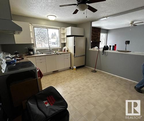 3707 53 Street, Wetaskiwin, AB - Indoor Photo Showing Kitchen With Double Sink