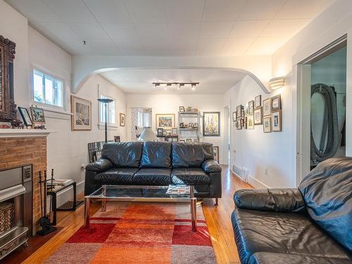 11646 94 Street, Edmonton, AB - Indoor Photo Showing Living Room With Fireplace