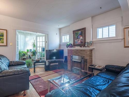 11646 94 Street, Edmonton, AB - Indoor Photo Showing Living Room With Fireplace