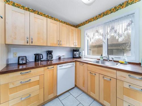 3158 78 St Street Nw, Edmonton, AB - Indoor Photo Showing Kitchen With Double Sink