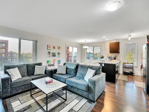 219 5515 7 Avenue, Edmonton, AB - Indoor Photo Showing Living Room