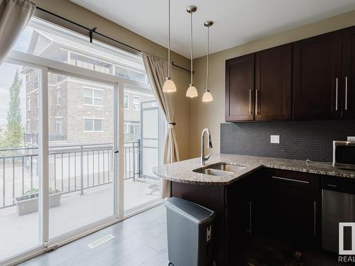 20 1623 Cunningham Way, Edmonton, AB - Indoor Photo Showing Kitchen With Upgraded Kitchen