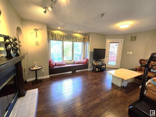 212 Ferguson Place, Edmonton, AB - Indoor Photo Showing Living Room With Fireplace