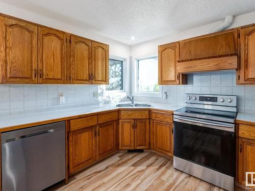 6 Bonin Place, Leduc, AB - Indoor Photo Showing Kitchen With Double Sink