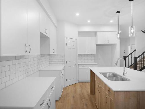 1233 16A Avenue, Edmonton, AB - Indoor Photo Showing Kitchen With Double Sink With Upgraded Kitchen