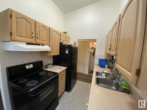 11839 45 Street, Edmonton, AB - Indoor Photo Showing Kitchen With Double Sink