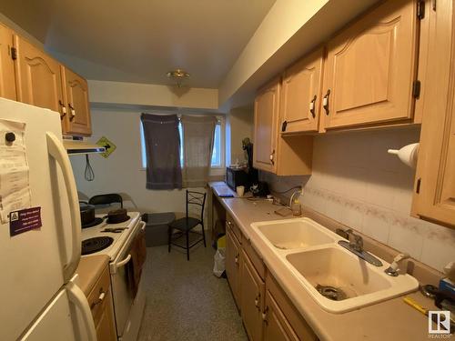 11839 45 Street, Edmonton, AB - Indoor Photo Showing Kitchen With Double Sink