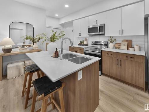 202 9223 228 Street, Edmonton, AB - Indoor Photo Showing Kitchen With Stainless Steel Kitchen With Double Sink With Upgraded Kitchen