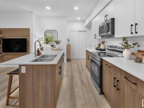 202 9223 228 Street, Edmonton, AB - Indoor Photo Showing Kitchen With Double Sink With Upgraded Kitchen