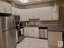 103 10006 83 Avenue, Edmonton, AB  - Indoor Photo Showing Kitchen With Double Sink 