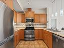 241 511 Queen Street, Spruce Grove, AB  - Indoor Photo Showing Kitchen With Double Sink 