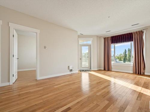 241 511 Queen Street, Spruce Grove, AB - Indoor Photo Showing Other Room