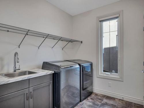 4409 Kennedy Cove, Edmonton, AB - Indoor Photo Showing Laundry Room