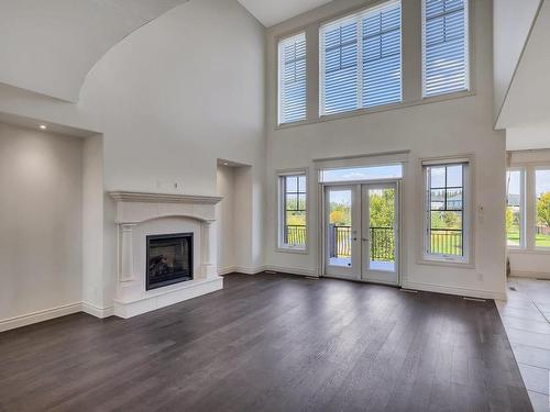 4409 Kennedy Cove, Edmonton, AB - Indoor Photo Showing Living Room With Fireplace