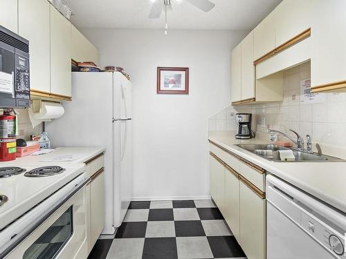 131 Knottwood Road N, Edmonton, AB - Indoor Photo Showing Kitchen With Double Sink