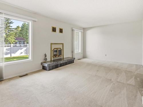 131 Knottwood Road N, Edmonton, AB - Indoor With Fireplace