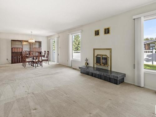 131 Knottwood Road N, Edmonton, AB - Indoor Photo Showing Living Room With Fireplace